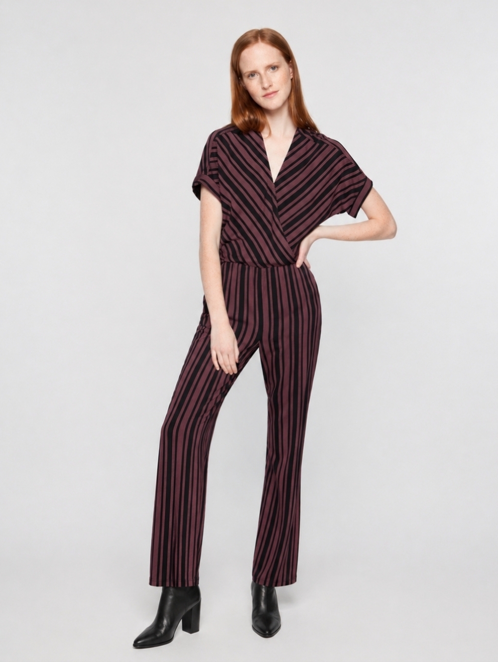 Armendals | Black and Pink Wrap Jumpsuit with V-Neckline and Fitted Waist